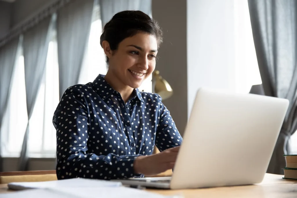 Girl working diligently at computer